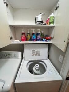 A white washer and dryer in a room.
