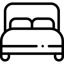 Illustration of a simple bed with a headboard, two pillows, and a blanket.