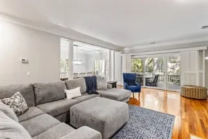 A living room with couches and chairs in it